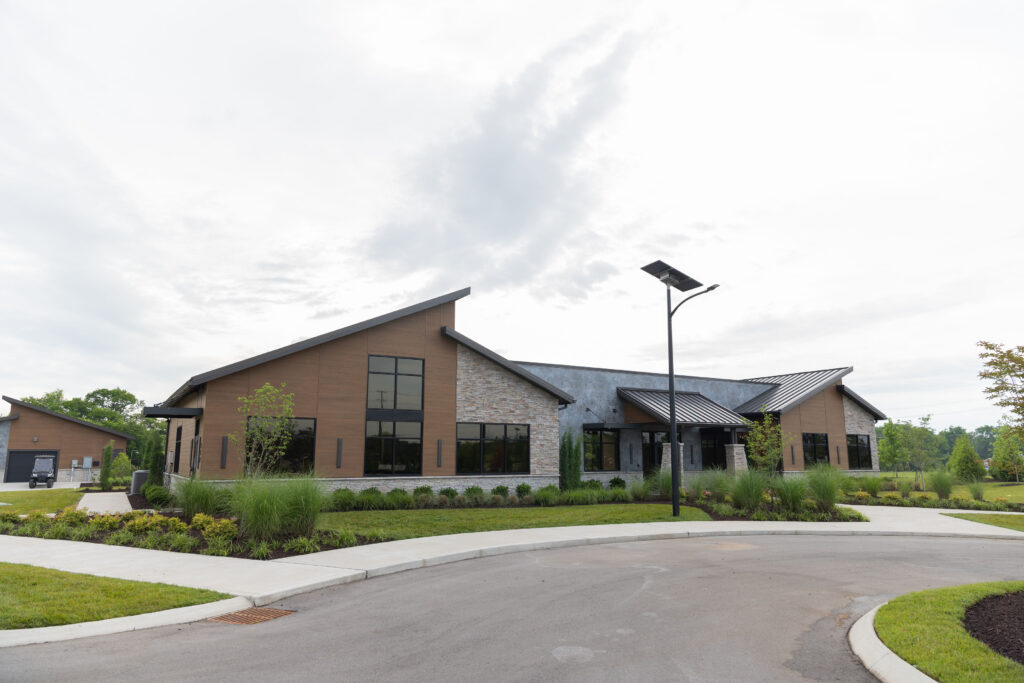 Commercial landscape maintenance at a Gallatin TN business property, featuring healthy turf, shrubs, and professional landscape design.