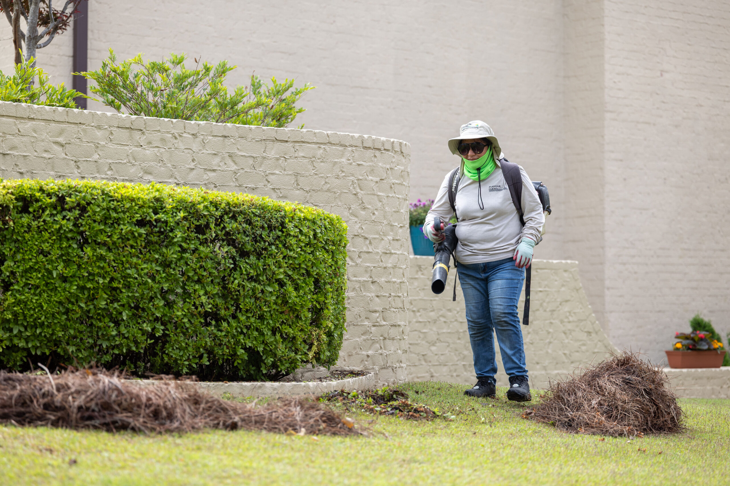 Commercial property fall cleanup crew at work